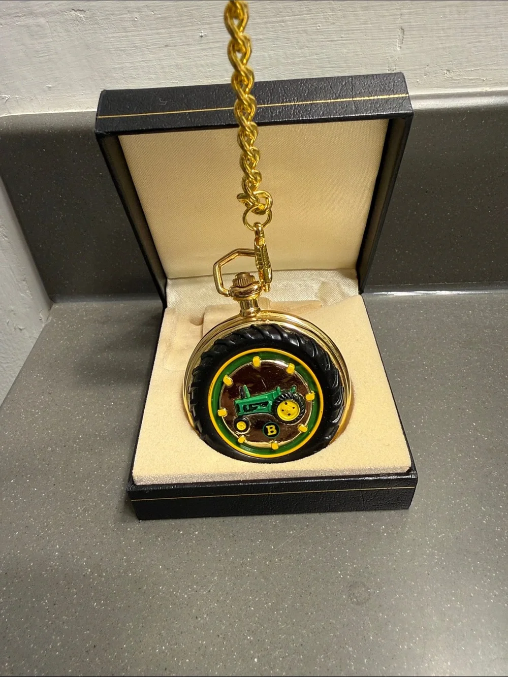 Gold Tone Tractor Pocket Watch Pendant with Black Tire Frame